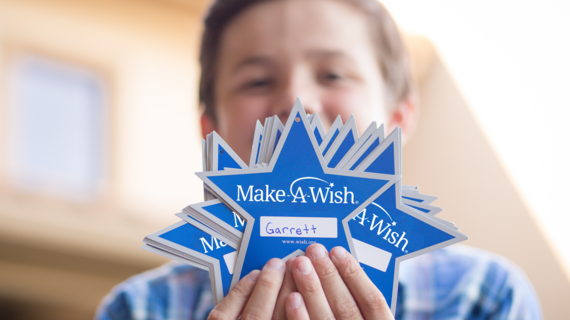 Wish Kid Garrett holding Wish Stars