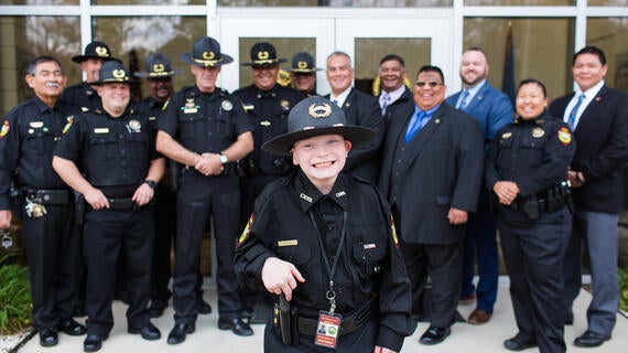 Joshua in police uniform