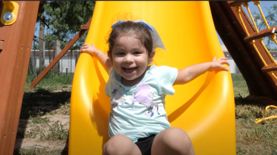 Teresa coming down the slide