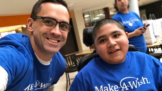 Wish granter Garrett with wish kid Israel