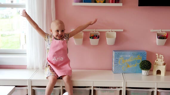 Aria enjoying her art studio