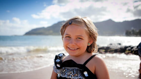 Wish kid on beach 