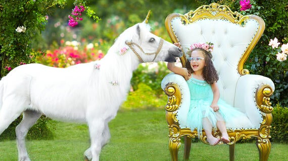 TXGF-Jonie in chair w unicorn