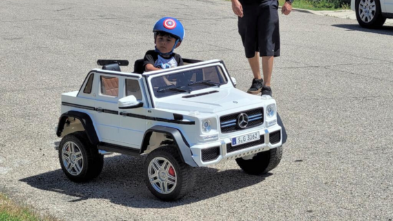 Nathan Driving His Power Wheels Car