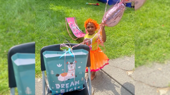 Wish child Destiny in an orange tutu and fairy wings