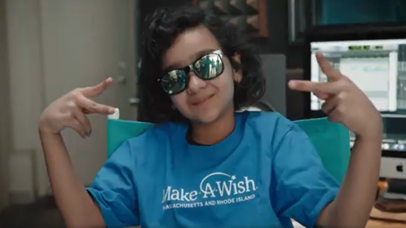 Wish kid Miraya in her blue Make-A-Wish t-shirt and sunglasses, hanging out in the recording studio