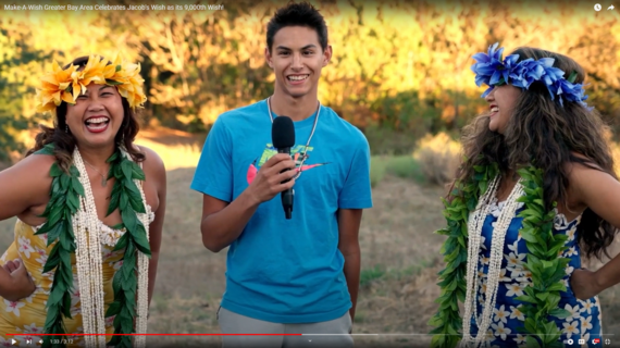 wish kid Jacob with hula dancers