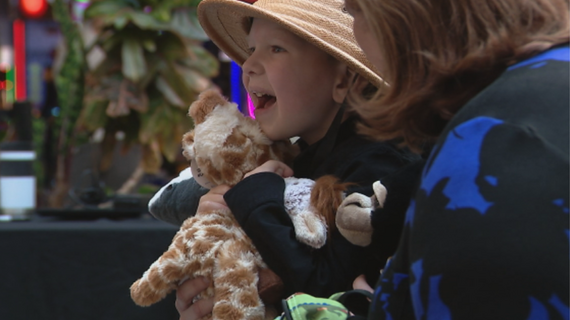Brayden smiles with pure joy upon finding that his wish is coming true