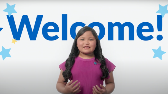 Wish Alumni Sophia smiles against a solid background with the text "Welcome!"