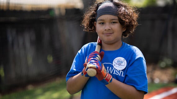 Fernie with a bat on his shoulder