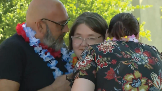 Rusha hugs her mom and dad after being surprised that her most heartfelt wish to go to Hawaii is coming true.