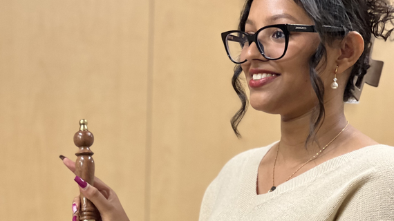 Gauri holding the cancer bell during her wish celebration