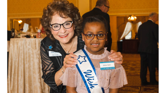 Patti Gorsky, CEO/President, with wish child Anna