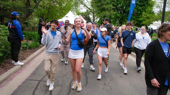 A group of walkers walking the zoo