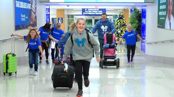 wish families running at airport to their plane