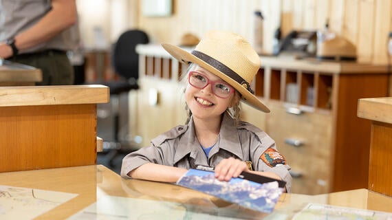 Ranger Sammy hands out maps