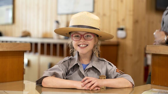 Ranger Sammy behind the desk 
