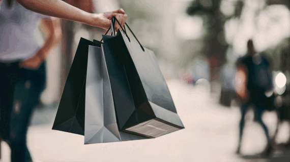 Someone holding shopping bags