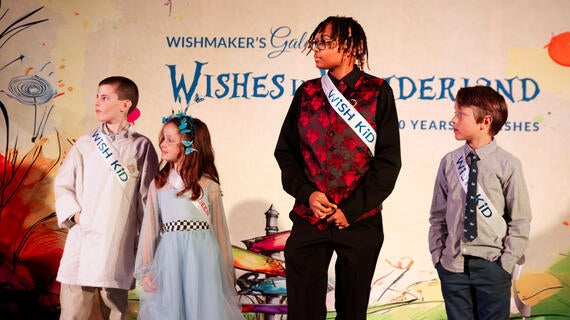 Wish Kids stand on stage at the 2026 Wishmaker's Gala in Wilmington NC.