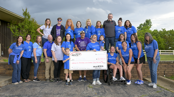 KTCS 2026 Event photo with grand total outside station