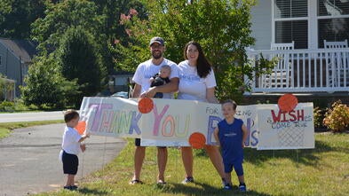 Wish kid Ben and family