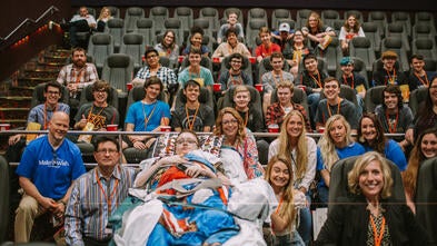 Evan with friends at a special Avengers Premiere made possible by Regal.