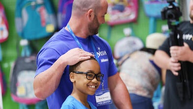 Wish granter Nick with wish kid Jace