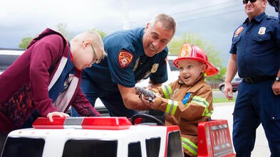 Eli takes his firetruck for a spin