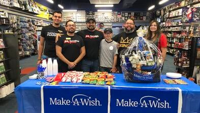 Francisco with the Gamestop employees