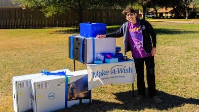 Wish Kid Theoden standing next to his wish gifts.