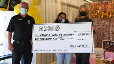 Bee Safe manager, wish kid Samara, and MAWCSTX CEO Kathrin holding a check for $6000