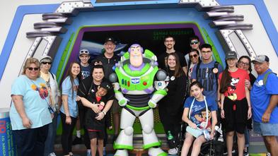 Lincoln and family with Buzz Lightyear