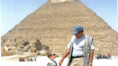 Nick stands in front of a Pyramid