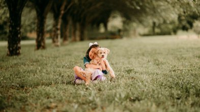 Maelin-Kate holds her wish puppy, Penny