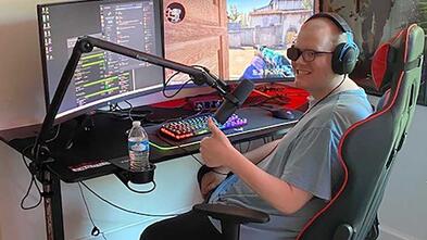 Warner, thumbs up with new computer