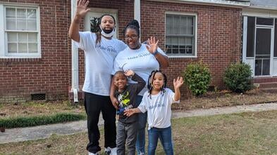 Wish kid Emoni and her family after a fun day of shopping