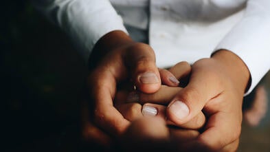 Doctor holding hands