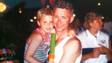 Elizabeth in Disney World with her dad 