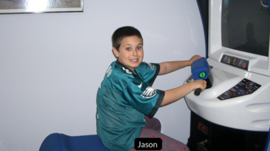 Wish Alum Jason with arcade games