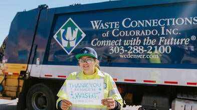 Brett in front of garbage truck