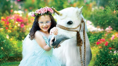 wish kid jonie with a unicorn