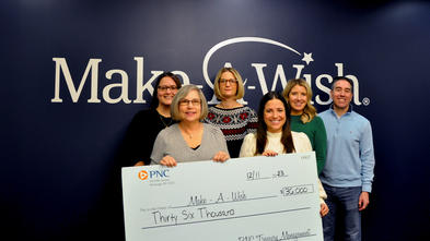 Pictured is Stephanie Pugliese, director of development with the PNC Treasury Management Golf Committee lead by chair Charlee Brindza making a presentation of $36,000. 