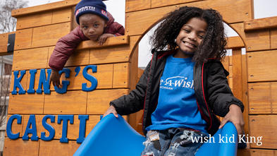 wish kid King and his brother playing on King's new castle playset