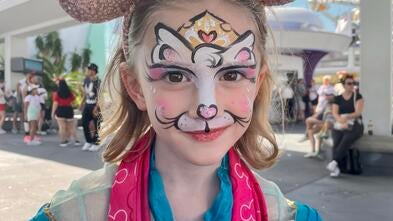 Zoe with her Mickey ears