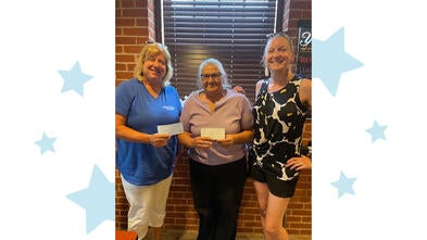 Ann Waltman, Make-A-Wish Regional Senior Director, Sherri Keller, Event Organizer and Becky Disney, Regional Development Associate.