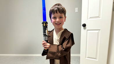 Boy dressed up as Luke Skywalker