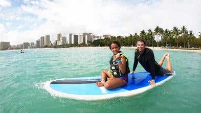 Wish kid Soraya on a surf board