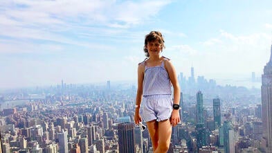 Wish Kid Alice in front of NYC Skyline