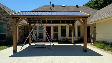 backyard pergola and wheelchair-accessible swing