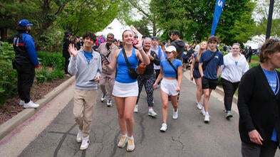 A group of walkers walking the zoo